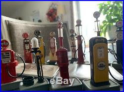 12 Cast Metal Miniature Gas Pumps With The American Gas Pump Collection Booklet