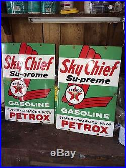 Two Texaco Gas Pump Signs