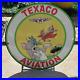 Vintage_1947_Texaco_Aviation_Tom_And_Jerry_Porcelain_Gas_Oil_Pump_Sign_01_fd